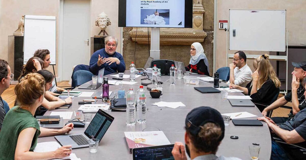 Seminar discussion around a large table